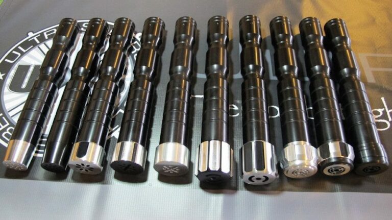 Here is a picture of the Dark Initiate v3 with some of our MHS compatible pommels for the Dark Liberator v3. From left to right: Catalyst, Dark Catalyst, Bellicose Long Grooves, Raven SS, Raven Plain, Dark Warglaive 2, Dark Warglaive, Arbiter, Archon, Consular pommels.